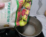 Foto langkah ke 4 dari resep Bubur Kacang Hijau topping kelapa muda.