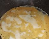 A picture of step 6 of Cheesy egg roll.