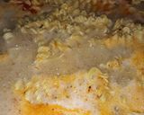 A picture of step 5 of Seafood indomie with fish chunks.