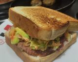 Foto del paso 8 de la receta: Sándwich🍗de pollo🥓y ensalada fresca🥯🧅🥑