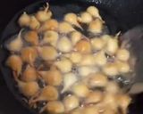 A picture of step 2 of Dahi Bhalley.