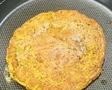 A picture of step 4 of Lobia chilla loaded with veggies.