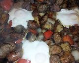 A picture of step 5 of Skillet fried sausage, mushrooms, peppers and onion with egg.