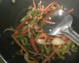 A picture of step 2 of Left over roti stir fry.