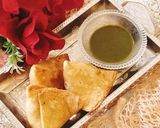A picture of step 6 of Aloo Matar samosa with homemade samosa patti.