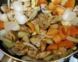 A picture of step 4 of Coconut Chicken Curry.