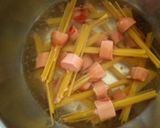 A picture of step 2 of Beef smokie Spaghetti with sauce.