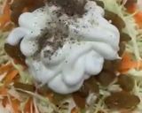 A picture of step 2 of Coleslaw with raisins.