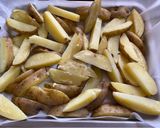 Foto del paso 3 de la receta: Cascos de papa a las finas hierbas