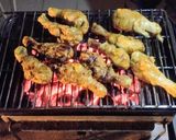 A picture of step 8 of Chicken paprika drums Skewered red hot Shrimps and grilled sausages.