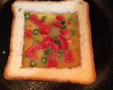 A picture of step 4 of Cheese Tomato Egg Toast.