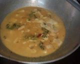 A picture of step 12 of Aloo posto.