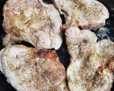 A picture of step 2 of Mushroom marsala pork chops.