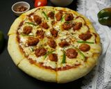 A picture of step 11 of Chicken Tikka Pizza.