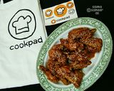 A picture of step 7 of Spicy wings with sauce.