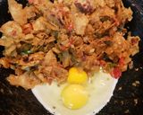 A picture of step 7 of Egg kothu chapati.
