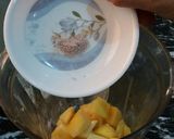 A picture of step 2 of Mango Peach Slush.