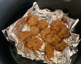 A picture of step 3 of Air fry chicken tots.