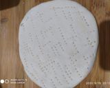 A picture of step 4 of Cheese burst pizza kadai baked.