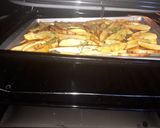 A picture of step 4 of Baked rosemary potatoe wedges.