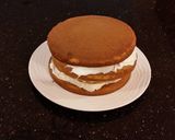 A picture of step 19 of White Peppermint Layer Cake with a White Peppermint Cream.