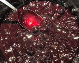 A picture of step 9 of Lemon Pepper Chicken with a Blueberry Orange Wine Sauce.