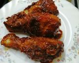 A picture of step 6 of Honey and ketchup glanced chicken drumsticks.