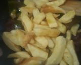 A picture of step 5 of Glaze honey chilli potatoes.