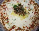 A picture of step 3 of Tomato cucumber raita.