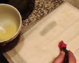 Foto del paso 2 de la receta: Dulce de plátano con masa filo🍌🥜🍫