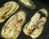 A picture of step 3 of Brinjal rolls in marinara sauce.