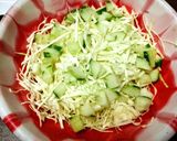 A picture of step 1 of Young cabbage salad with cucumber.