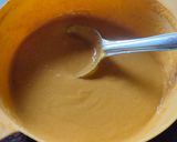 A picture of step 3 of Mango malpua with fresh cream.