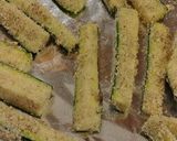 A picture of step 5 of Parmesan zucchini fries with spicy appetizer dipping sauce.