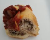 A picture of step 10 of Sardine Empanadas with Tomato and Onion Sauce.
