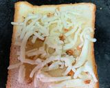 A picture of step 2 of Garlic cheese bread.