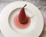 Foto del passaggio 4 della ricetta Pere al vino rosso