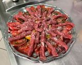 A picture of step 9 of Beef Carpaccio with Heirloom Tomatoes and Parmesan.