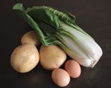 A picture of step 1 of Swiss Chard and Potato Casserole with Crispy Pepper Powder, Feta, and Lemon Zest.