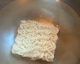 Une image de l'étape 1 de WOK aux feuilles et côtes de CHOU-FLEUR.