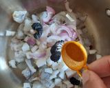 A picture of step 3 of Prawns Coconut Recipe Prawns Thengakoth Coconut slices ularth.