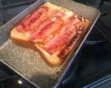 A picture of step 5 of Egg-in-a-Hole Bacon Toast.