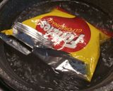 A picture of step 2 of Easy Peasy cheesy crisps omelette.