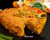 A picture of step 7 of Cheesy Maggi vegetable cake.