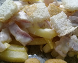 Foto del paso 5 de la receta: Papas fritas con salsa y crutones