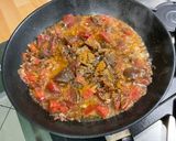 Une image de l'étape 9 de Tagliatelles vertes aux anchois, ail, tomates et persil.