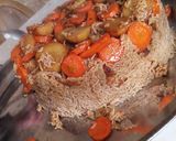A picture of step 10 of Maqluba (the upside- down pot).