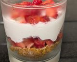 A picture of step 4 of Biscoff strawberry cheese cake in glass.