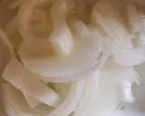 A picture of step 5 of Bistec encebollado.