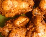 A picture of step 3 of Garlic fried rice with crispy chicken wings.